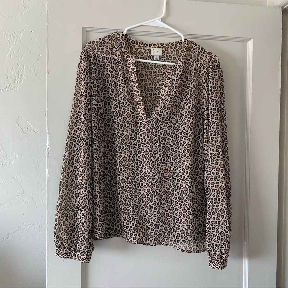 A new day leopard floaty blouse